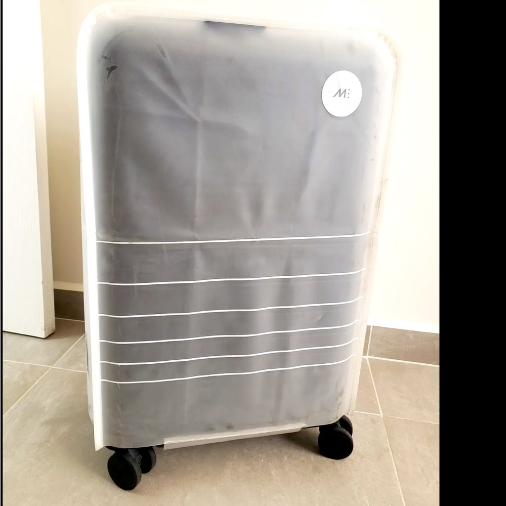 Monos Luggage Cover Large Check In Luggage - Clear